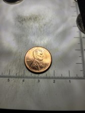 2003 Struck Through Grease Error Penny Also L Missing In Liberty under scope. picture
