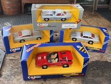 4 Corgi Die-Cast Cars, 1984/86 James Bond Aston Martin, Plus Ferrari & Mercedes picture