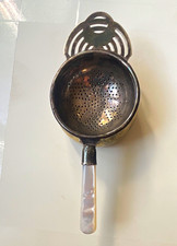 Mother of Pearl  and sterling silver tea strainer set of 2 Antique Made-England picture