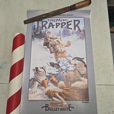 1996 Remington Bullet Knife Mini Trapper Calendar 30x20 picture