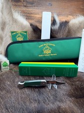 1990 Puma 460 Cadet Knife With Green Checkered Handles Mint In Factory Box picture