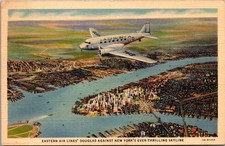 Eastern Air Lines Douglas Plane Flying Over New York City Vintage Postcard picture
