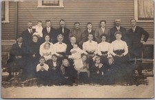 Vintage 1910s Photo RPPC Postcard Large Family Posing on Side of House / Winter picture