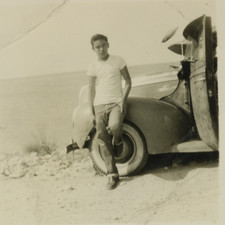 FOUND PHOTO Young Native American Man posing with Car 1950s North Dakota picture