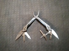 Cabela's Multi Tool Pocket Knife Great Usable Condition Scissors Saw Pliers Ect picture