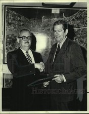 1974 Press Photo New Orleans Port Director E.S. Reed congratulated by J.C. East picture