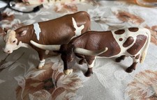 Schleich  Simmental Cow and a Longhorn-style bull Figures Brown And Whit picture