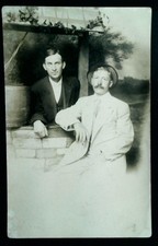 Vintage ARTURA Real Photo Postcard of Two Men by Well with Hat picture