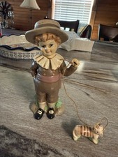 Vintage Boy Porcelain Figure With Cat On A Leash picture