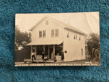 RPPC Lakeville Michigan Linder Longer Korner Store Flower Photo Posted 1922 picture