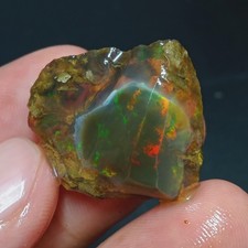 24.60 Ct Crystal Opal Rough Stone - 27x21x9 mm with Vibrant Play of Color Rough picture