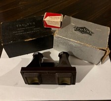 tru vue viewer,with one film . Box slightly damaged  picture