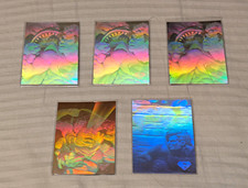 1996 SkyBox Superman Holo Series - H3, Three H4's, Bonus Gold Holo picture
