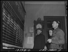 Photo:Fort Madison Iowa 1943 Santa Fe Railroad Workers Studying Call Board picture