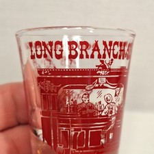 Vintage Long Branch Saloon Shot Glass Dodge City, Kansas Boot Hill Souvenir Red picture