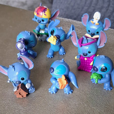 Disney Lilo & Stitch Stitch Mini Figurines Lot of 7, Under 3 in picture