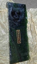 A raw slab of dark green British Columbia nephrite jade. picture