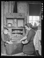 Lititz Pennsylvania Mennonite Farmer�s Wife and Son Husking Corn 1942 picture