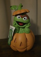 Sesame Street Halloween Figurine Featuring Oscar The Grouch In A Jack-O-Lantern picture