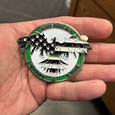 Americas Front Line- The Wicked Flee- Challenge Coin picture