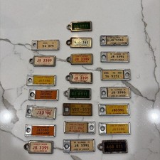  Vintage DAV  Keychain License Plate Lot of 22 picture