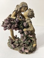 Vintage 8 Inch Kissing Boy and Girl In Tulips Resin Figurine Beautiful picture