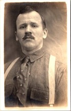 GENTLEMAN APPEARING SAD :DRESSED FOR WORK : ARTURA STAMP BOX : RPPC  1908-1924 picture