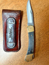 Buck 110 folding knife with sheath picture