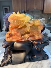 Dragon yellow Fluorite with gourd UV reactive carving with custom wood stand picture
