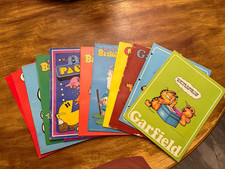 1970’s to 1980’s Lot Garfield Pac-Man Smurfs Smurfette The Biskitts folder’s. picture
