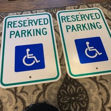 Reserved Parking Handicap.  Aluminum 18”x12”.  Qty 2.  Reflective picture