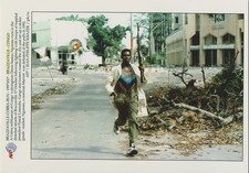 A21 A2118 – Congo: Cobra Militant Running Through War-Torn Brazzaville, 1997 picture