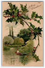 1907 Christmas Man Canoeing Holly Berries Embossed Nash Glenco Mills NY Postcard picture