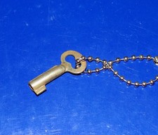 Tiny Vintage Hollow Barrel Skeleton Key picture