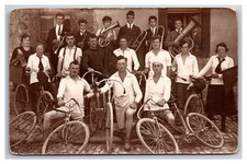 RPPC touring bicycle Cyclists & musicians Band wind instruments tuba. picture