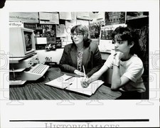 1988 Press Photo Jane Jacobs helps Allegra Hosford with SAT prep course in Miami picture