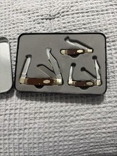 Old Timer Collectible Advertising Tin Case w/ 4 Small Folding Pocket Knives picture