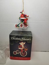 Vintage 90s Christmas Charmers Ornament 3 Wheeling Santa picture