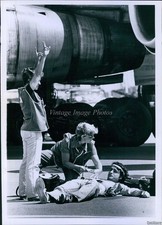 1979 Aviation Safety Drill Woman Practices Medical Exercise Planes Photo 7x9 picture